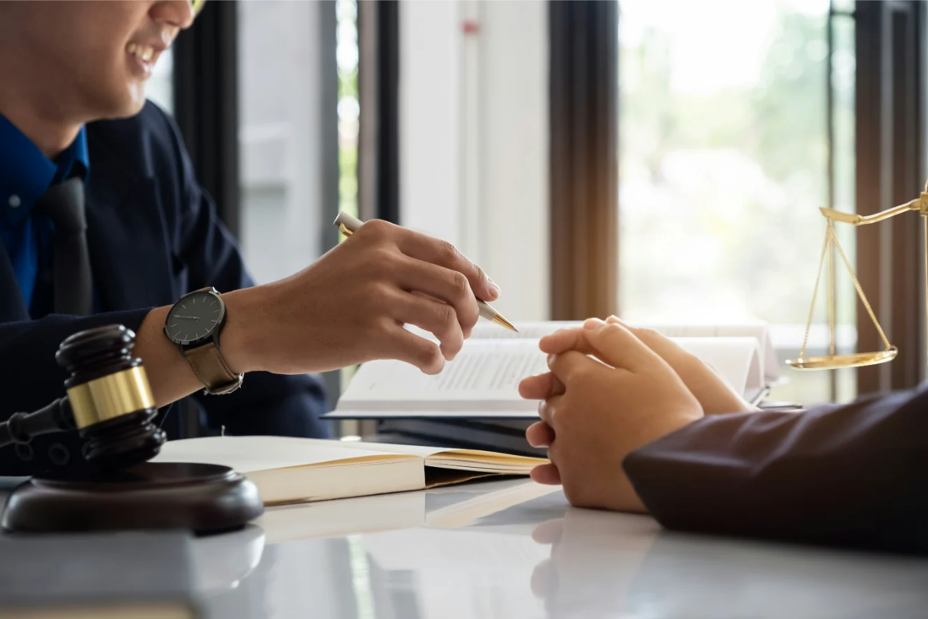 Lawyer and client discussing personal injury claim and statute of limitations.