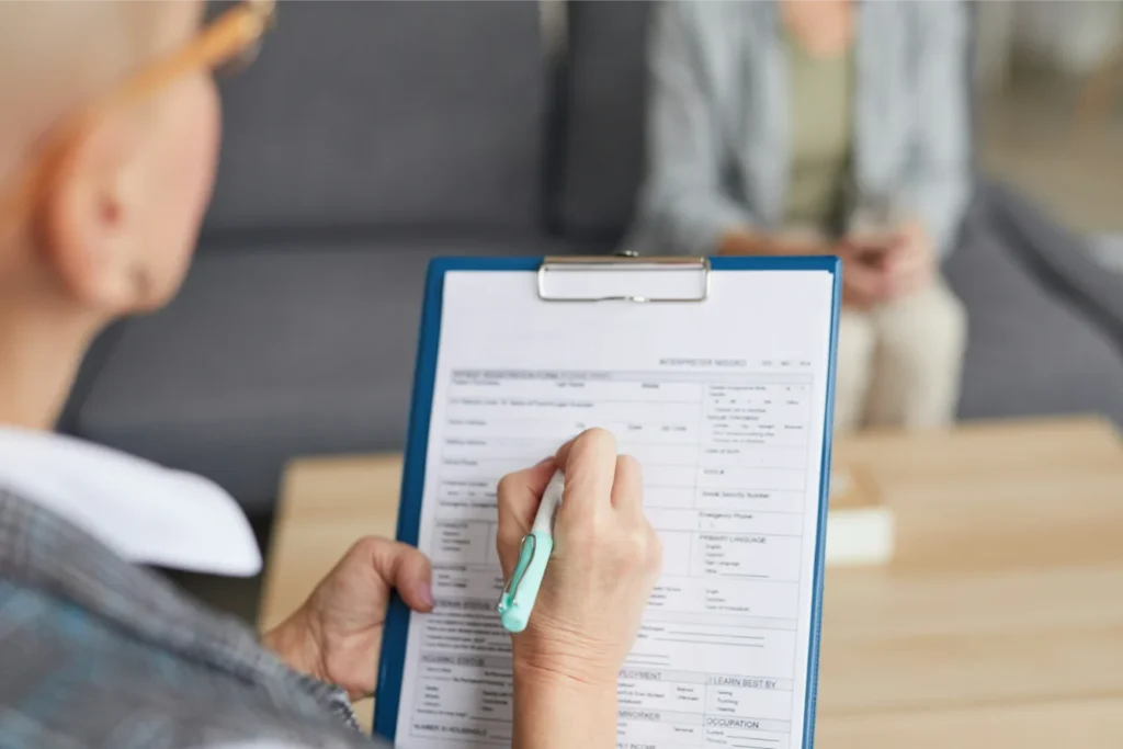 Legal consultation and paperwork for personal injury claim in Florida.