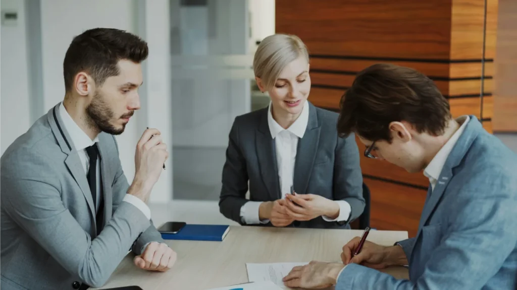Business professionals discussing legal matters and personal injury claims.
